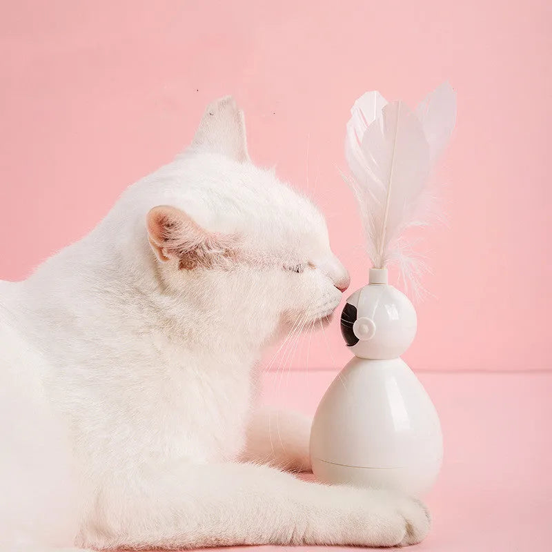 Tumbler cat toy in white, yellow, or pink with ABS body and feather replacement pieces.
