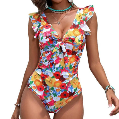 Women's printed one-piece swimsuit in polyester fabric, shown in picture colour.