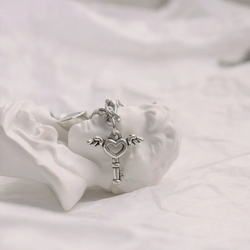 Heart-shaped couple bracelets with adjustable chain, perfect for romantic gifts.
