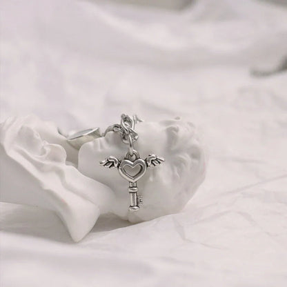 Heart-shaped couple bracelets with adjustable chain, perfect for romantic gifts.