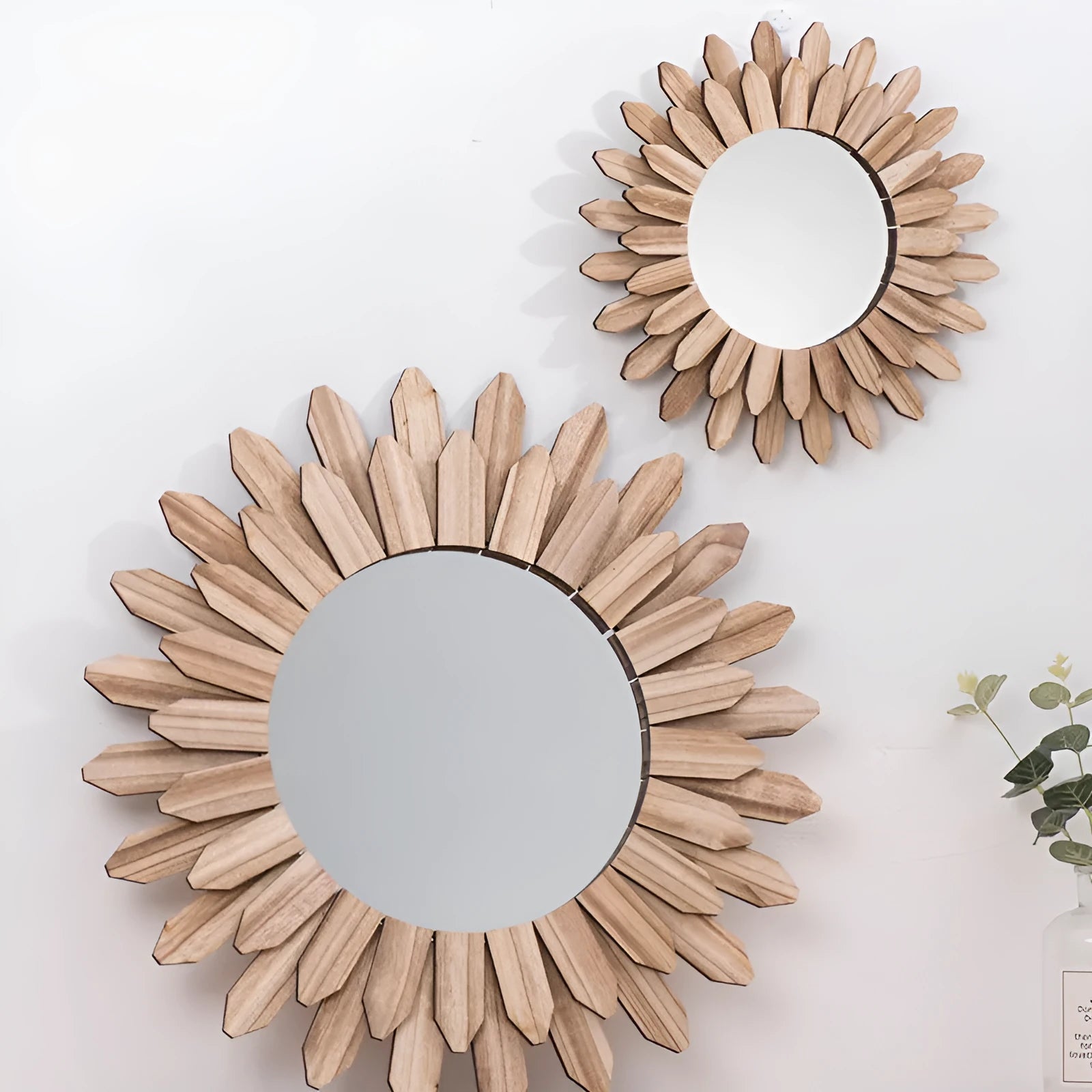 Round European-style solid wood hanging mirror with baked colour frame on a wall.