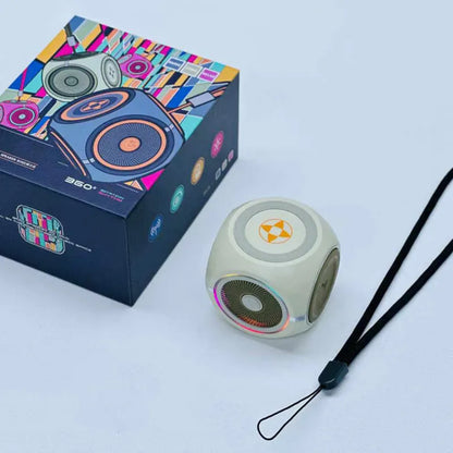 Rotating gyro bass Bluetooth speaker in black, pink or green, 53x51x51mm, with USB cable