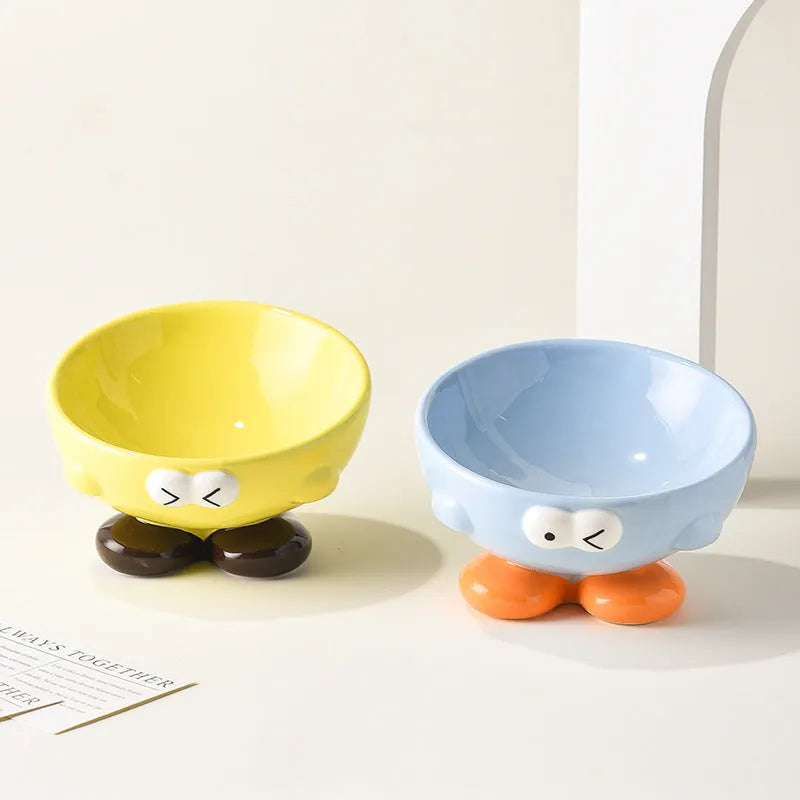 Ceramic slanted pet bowl with decorative expression pattern in blue colour