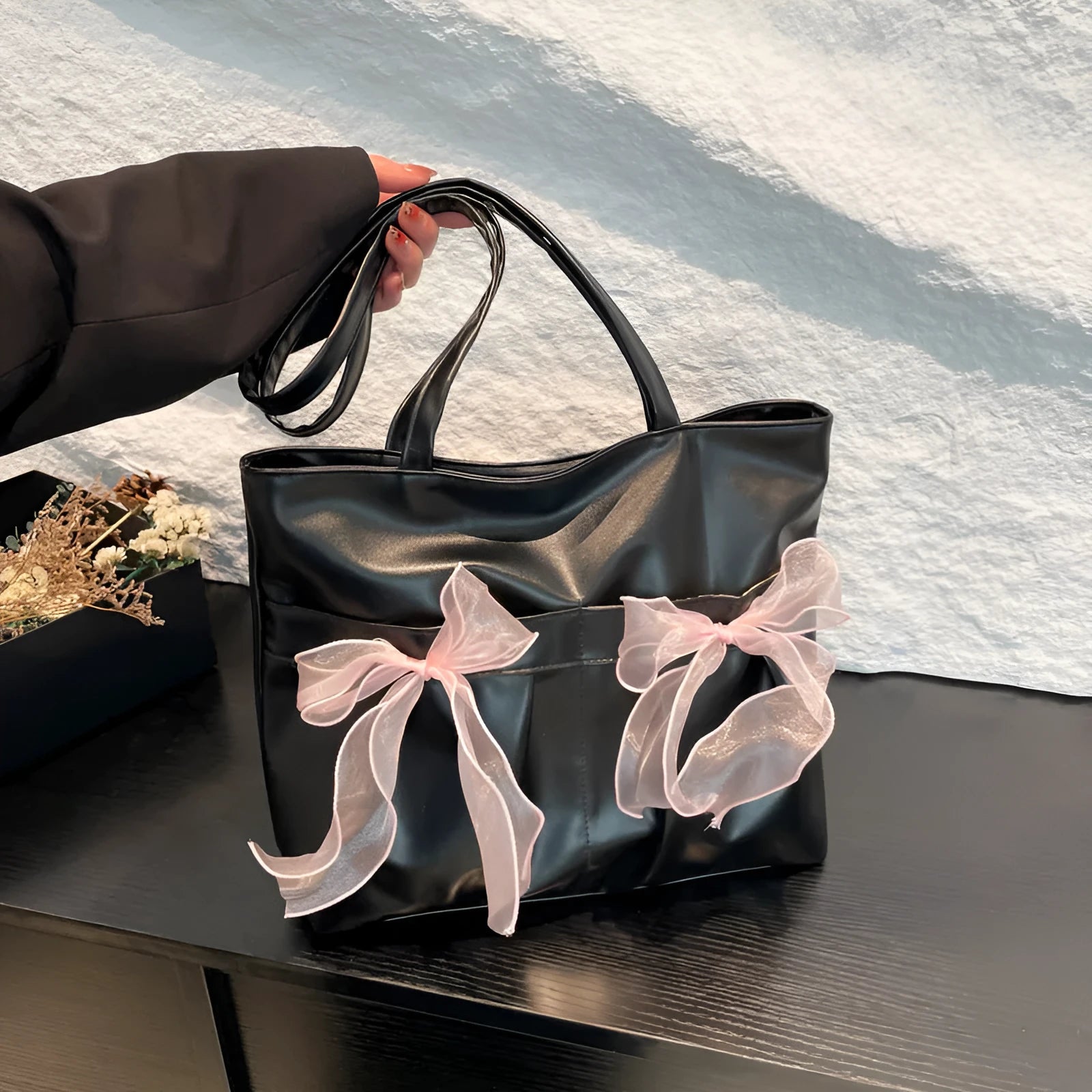 College style bow tote bag in black PU leather with double shoulder straps and bow detailing