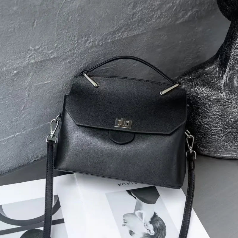 Genuine vegetable-tanned leather messenger bag in urban simplicity style with internal organisation pockets