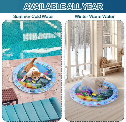 Blue ocean-themed cat water play mat with floating fish toys inside an inflated square border on a wooden floor.