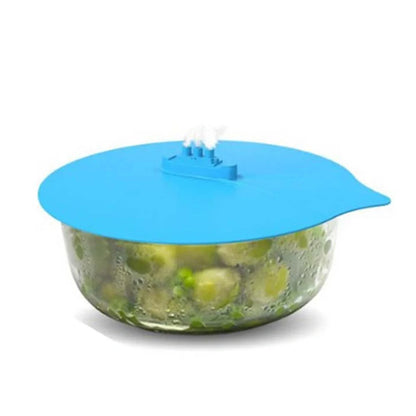 Blue silicone steamer lid on kitchen bowl showing airtight seal and flexible edges