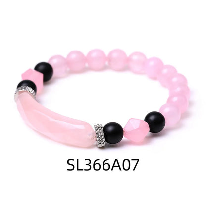 Handmade diamond-shaped cut black agate geometric bracelet showing fan-shaped bead arrangement.