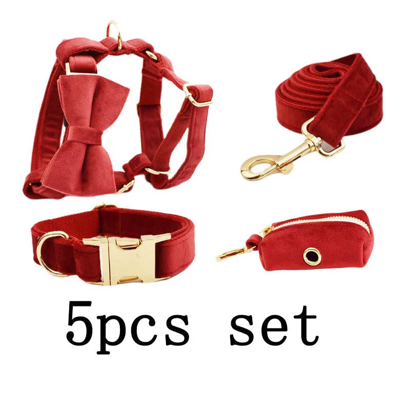 Cloth dog collar set with matching leash, bow tie, vest, and poop bag accessories