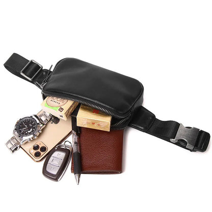 Men's small leather crossbody bag in black showing compact dimensions and crossbody strap