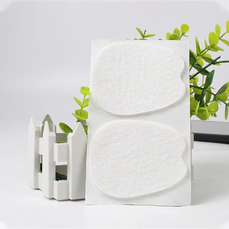 White thin felt anti-wear shoe tongue stickers showing front pad design for friction prevention