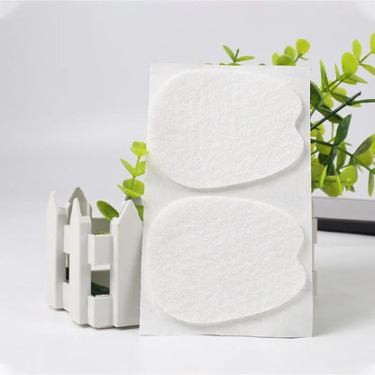 White thin felt anti-wear shoe tongue stickers showing front pad design for friction prevention