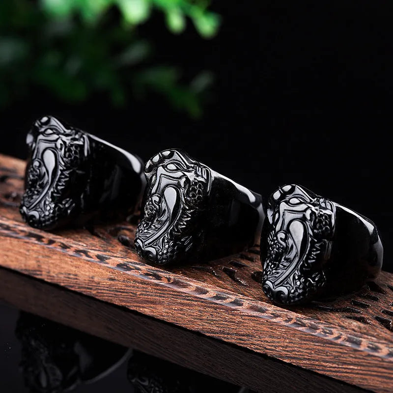 Men's gold sheen obsidian Pixiu thumb ring with alloy band in size 19, 20, 21, or 22.