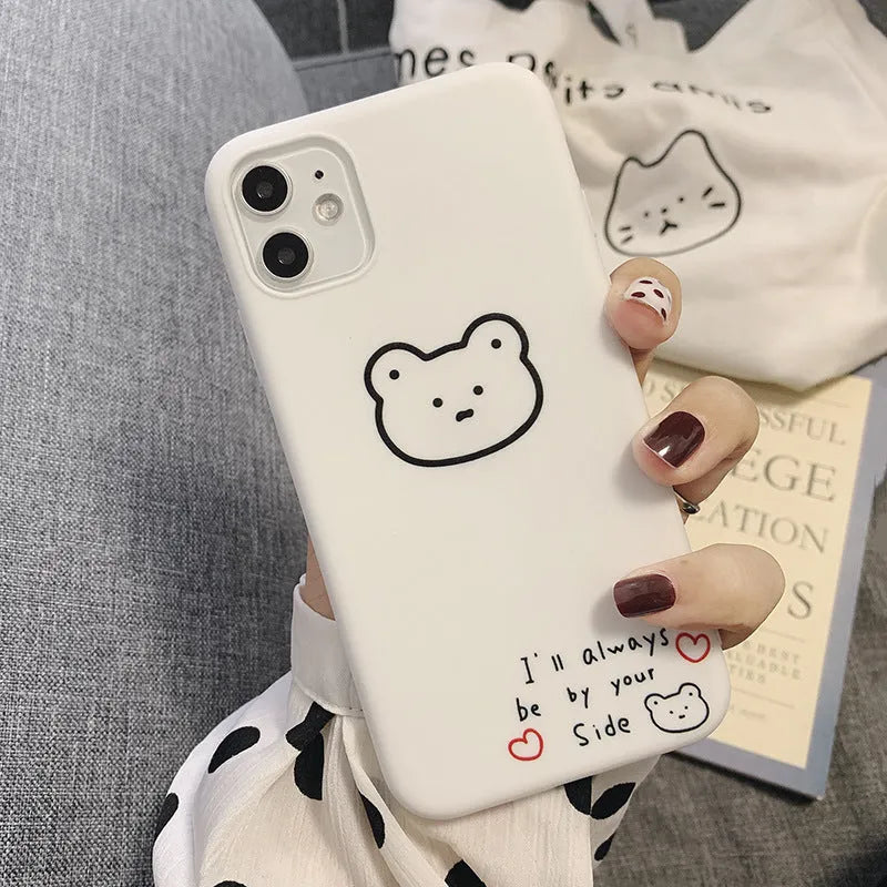 Silicone iPhone case with a Korean cartoon bear design on the back.