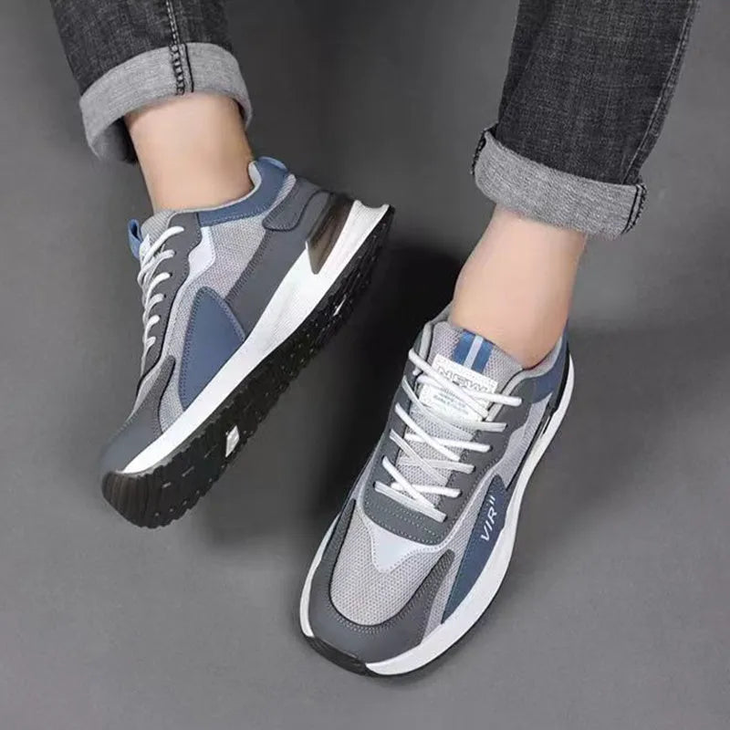 Men's colour block mesh sneakers in black, grey, and white with lace-up front and low-top design