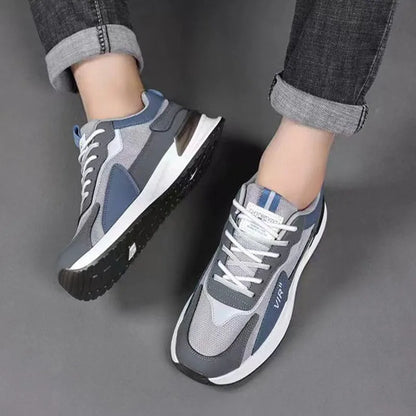 Men's colour block mesh sneakers in black, grey, and white with lace-up front and low-top design