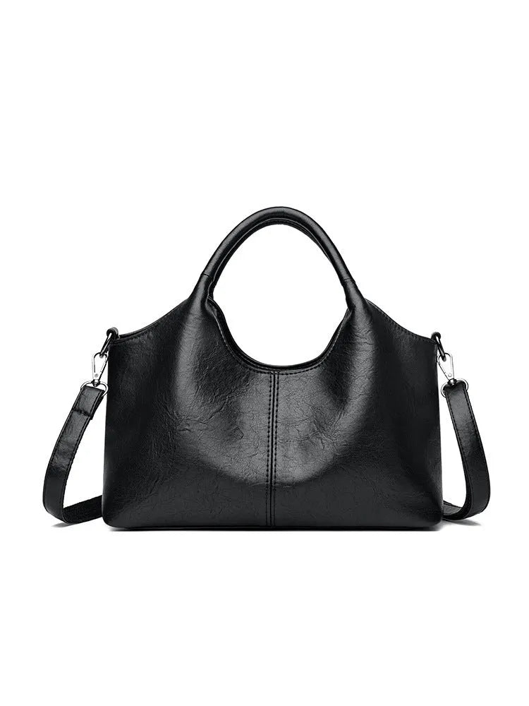 Women's soft genuine leather large crossbody bag shown in available colours: black, brown, wine red, yellow, beige, bronze, green.