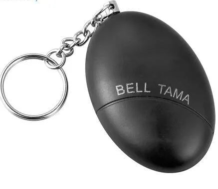 Compact black personal alarm keychain with pull-ring for loud siren activation, shown next to a ruler showing 6cm length.