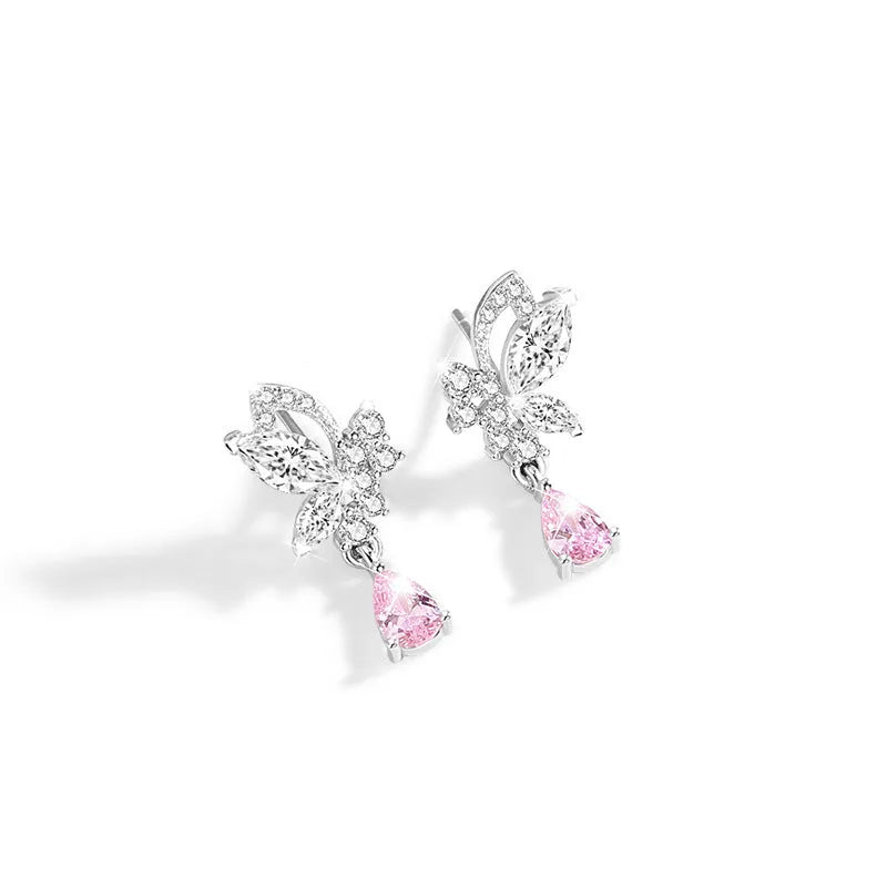 Butterfly shaped silver stud earrings with Swarovski crystal details on wings