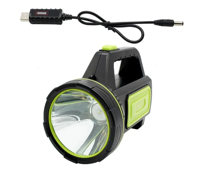 Green rechargeable super bright LED flashlight with USB port on a table