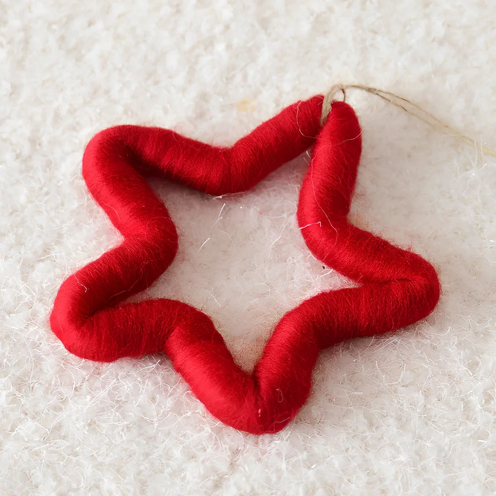 19cm wool felt snowflake and 13cm star Christmas decorations with intricate cut-out patterns