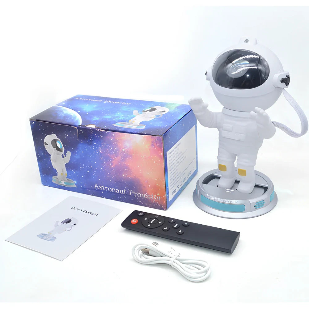 White enamel astronaut starlight projection lamp on base, projecting northern lights and stars, size 22.5 x 12.5 x 12.5cm, USB powered