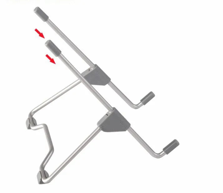 Grey aluminium and plastic adjustable stand holding a mobile phone on a wooden desk.