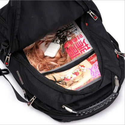 Black 38-litre business laptop backpack open to show computer layer and organisation compartments.