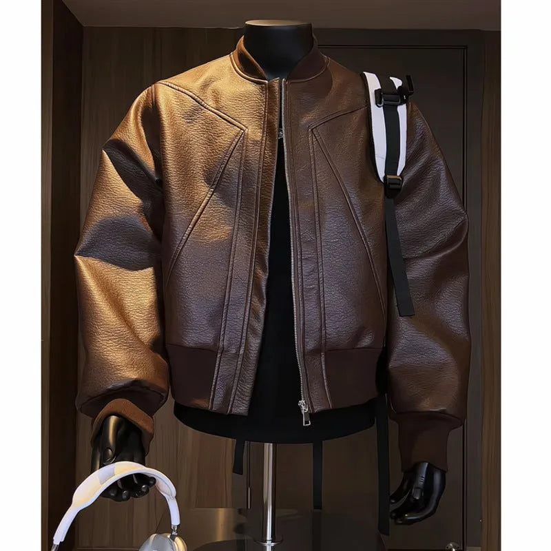 Man wearing a long black PU leather jacket with a litchi grain texture, showing its extended 100cm length and tight fit.