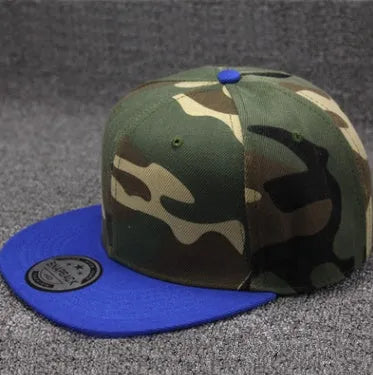 Camo snapback cap with flat brim, cotton polyester, adjustable closure, shown in black, blue, camouflage, and navy blue.