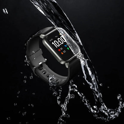 Black waterproof smart fitness bracelet with a 1.4-inch screen on a silicone wrist strap.