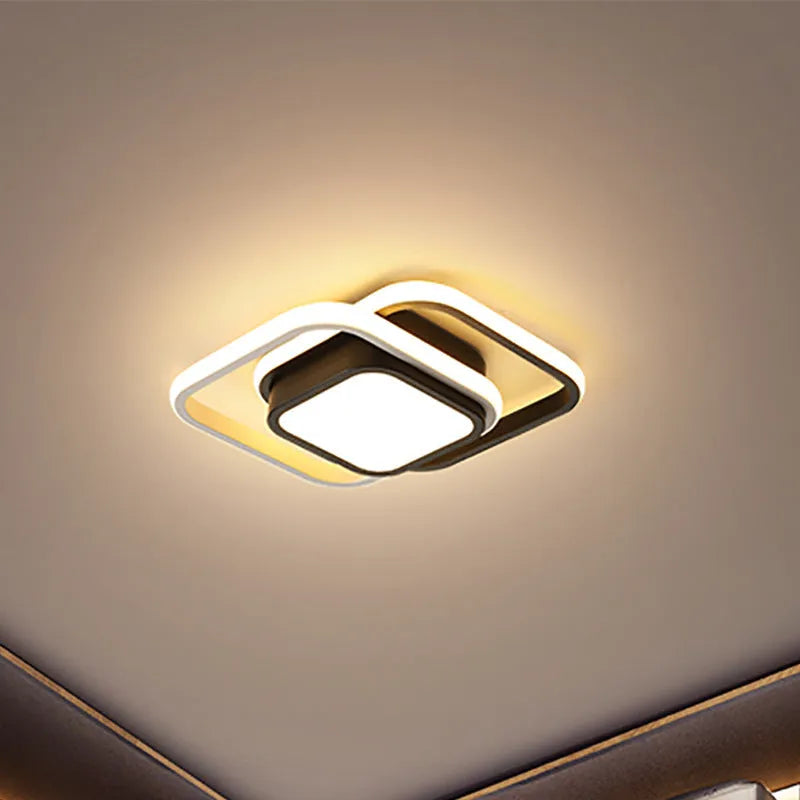 Modern geometric aluminium ceiling light in round and square styles with LED illumination.