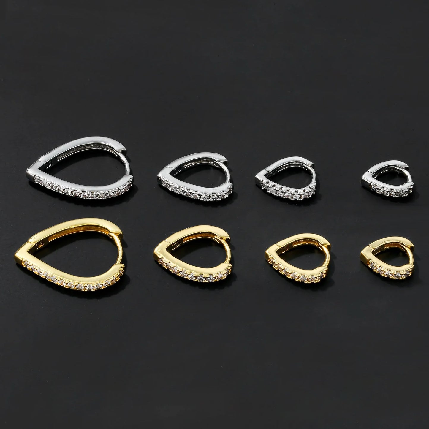 Copper geometric heart ear clip with electroplated gold finish, showing love design and net red wind style for summer accessories