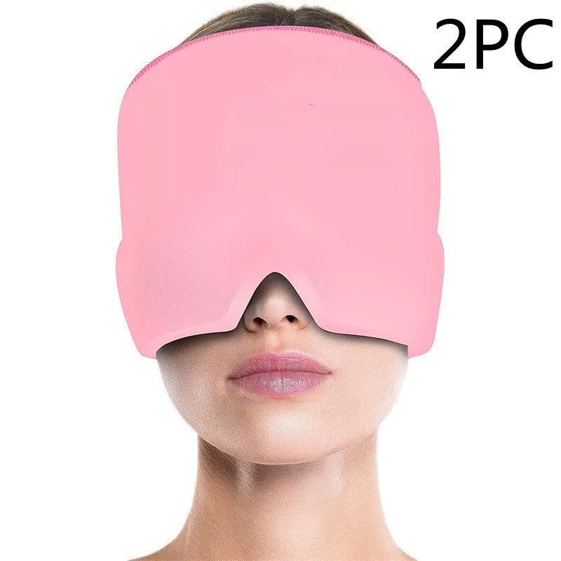 Black elastic cloth gel cold compress eye mask for headache relief on a grey background.