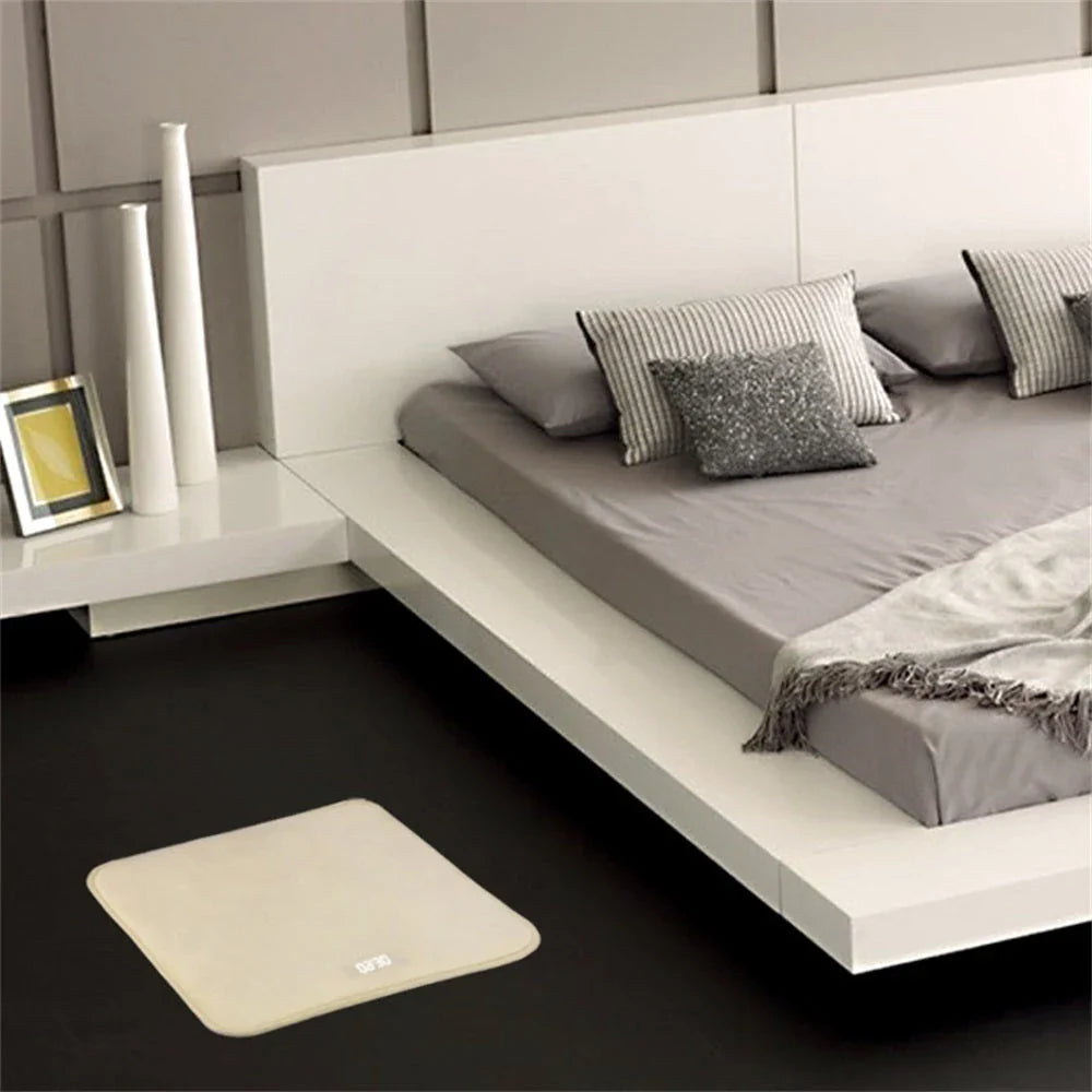 Smart pressure-sensitive alarm clock with LED display and memory foam base for comfortable, refreshing mornings