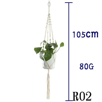 Handmade beige cotton rope net bag holding a plant pot, showing its textured sling design.