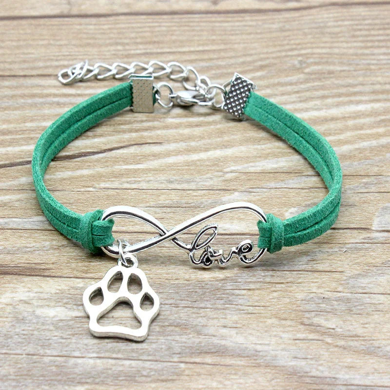Stylish hand-woven infinite love pet bracelet in various colours, featuring a bow design and made of premium alloy materials