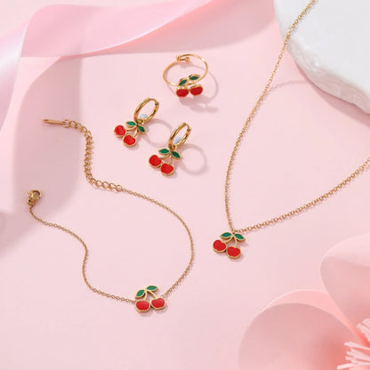 Cherry jewellery set with necklace, bracelet, earrings and ring in gold electroplated stainless steel with geometric fruit design
