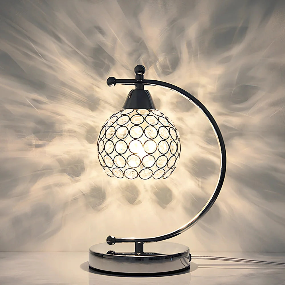 Crystal table lamp with chrome iron body measuring 31cm height