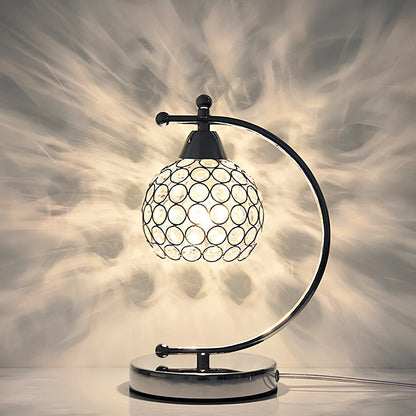 Crystal table lamp with chrome iron body measuring 31cm height