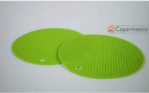 Set of six flexible silicone pot lids in assorted sizes on a kitchen counter.
