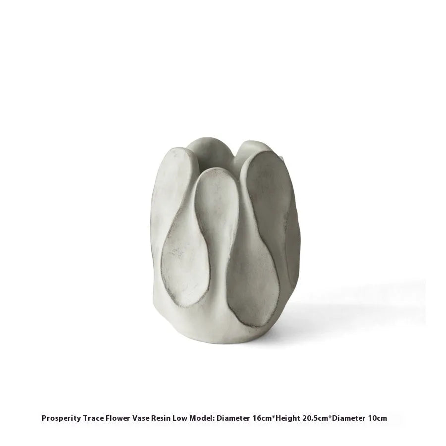 Hand-formed irregular ceramic vase measuring 25cm tall with 15cm diameter opening, made from magnesium clay