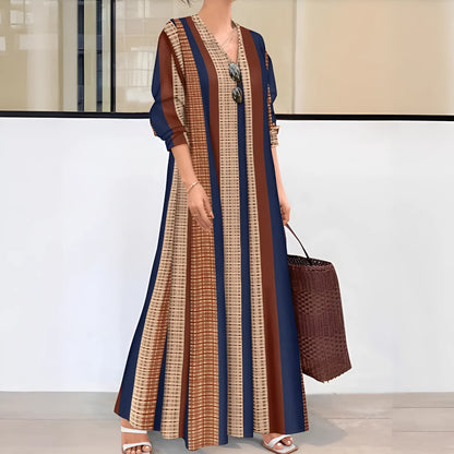 Camel coloured vertical striped V-neck knitted long sleeve dress on a hanger.