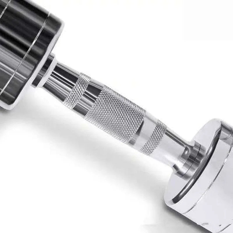 Silver pure steel electroplated dumbbell on a grey background, showing ergonomic handle.