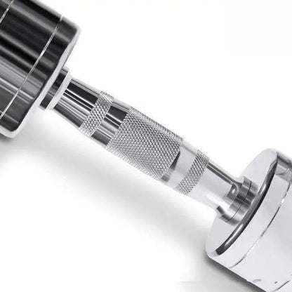 Silver pure steel electroplated dumbbell on a grey background, showing ergonomic handle.