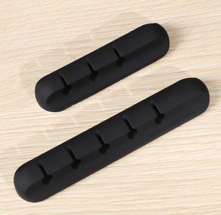 Black silicone USB cable winder for desktop cable management