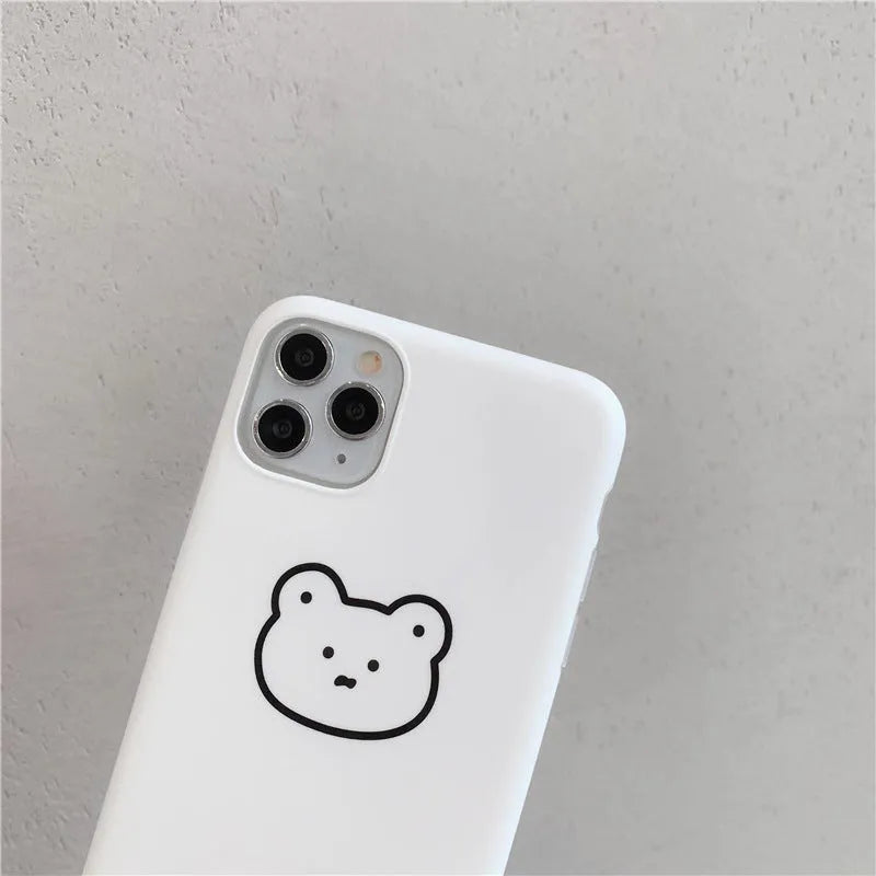 Silicone iPhone case with a Korean cartoon bear design on the back.