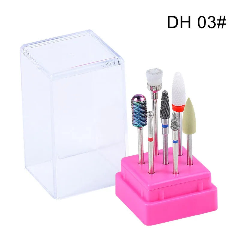 Set of six tungsten steel nail drill bits and a brush in a clear plastic case.