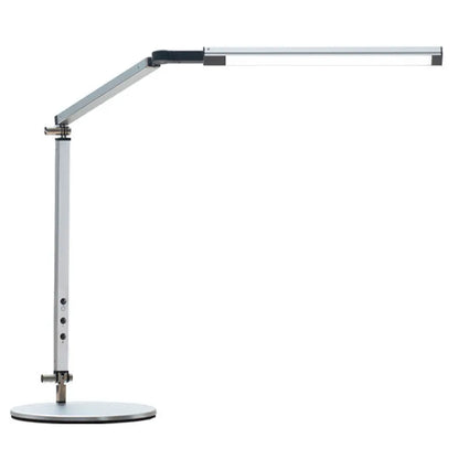 Adjustable aluminium desk lamp with remote control, shown in black with a clip attached to a desk edge.