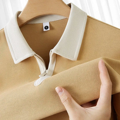 Zipper and lapel polo shirt in solid colour with short sleeves and loose fit